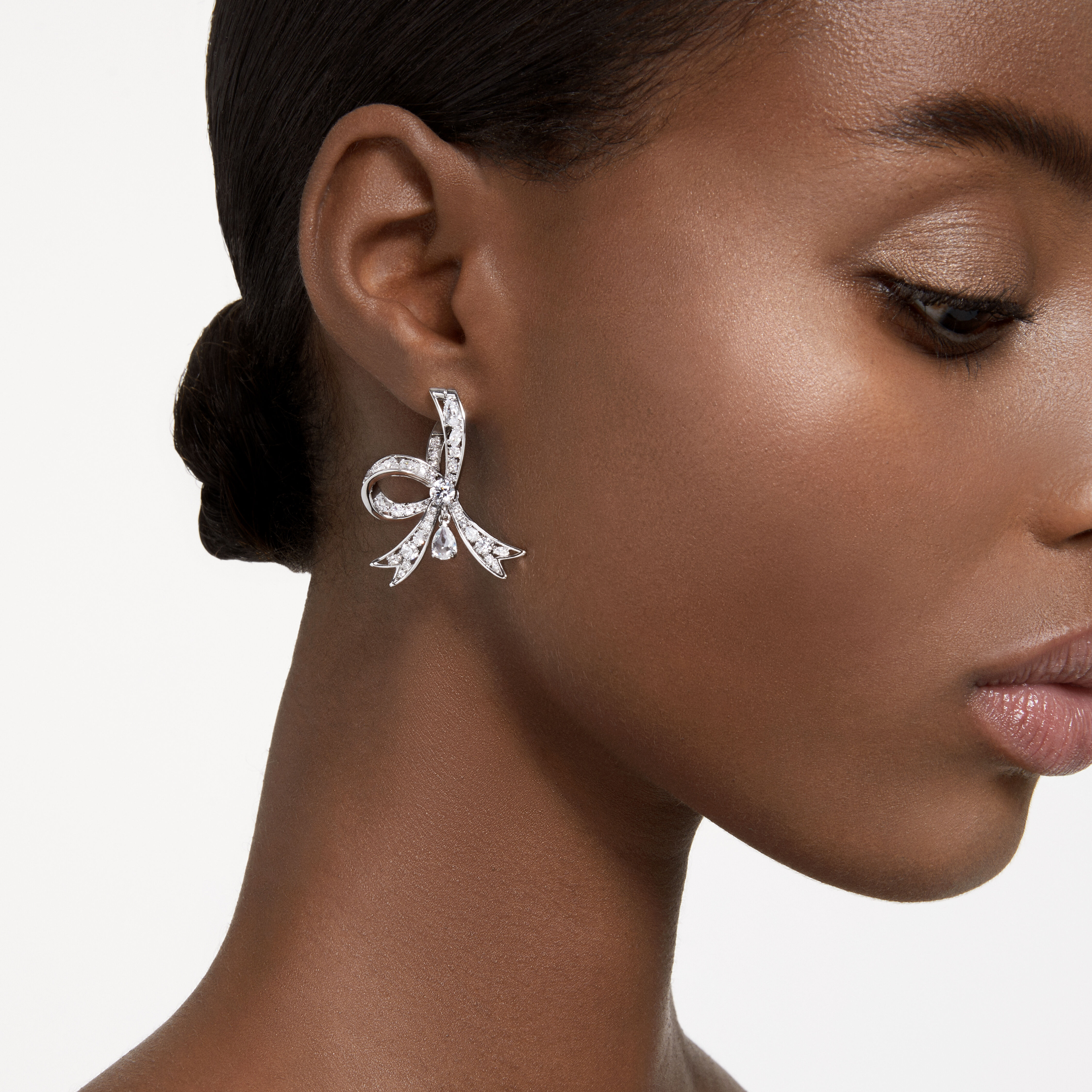 Swarovski bow sales earrings