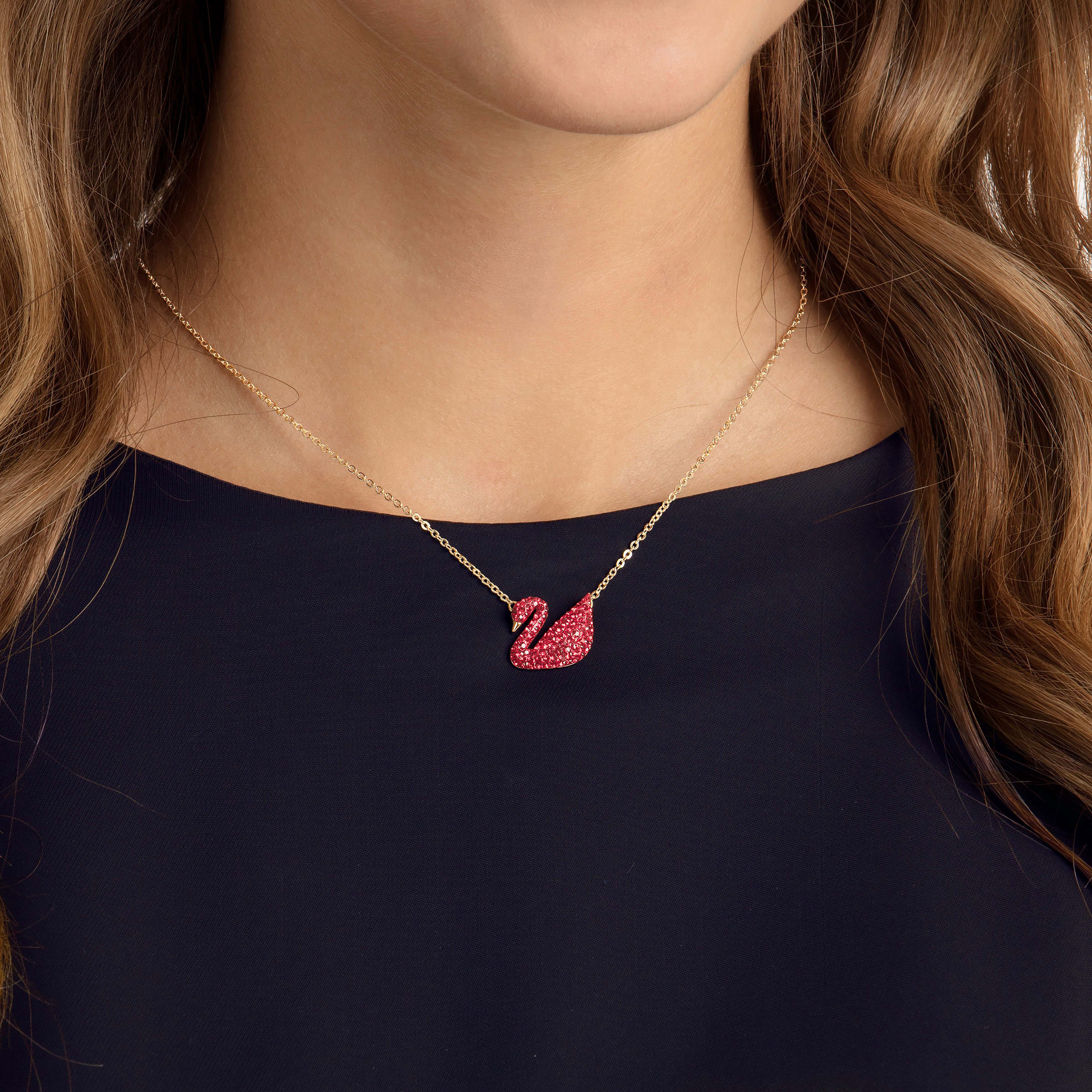 Buy Swarovski Iconic Swan Pendant Red Gold plating