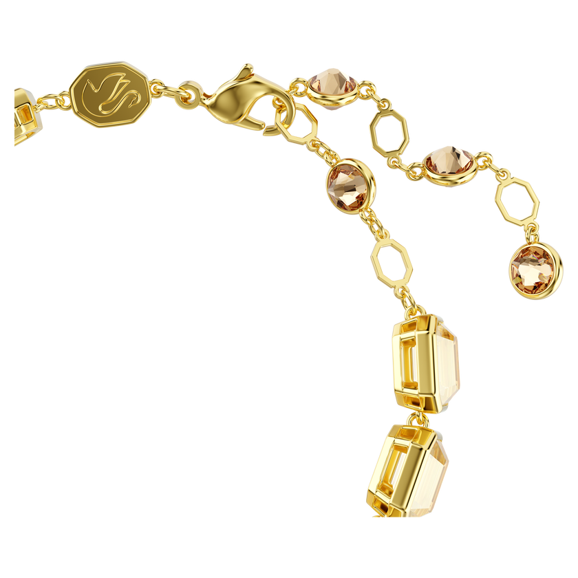 swarovski millenia tennis bracelet  octagon cut  caramel  gold tone plated